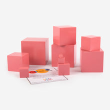 Load image into Gallery viewer, Pink wooden cubes of different shapes, montessori activity
